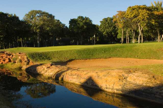 A view of a green at Oak Tree Country Club