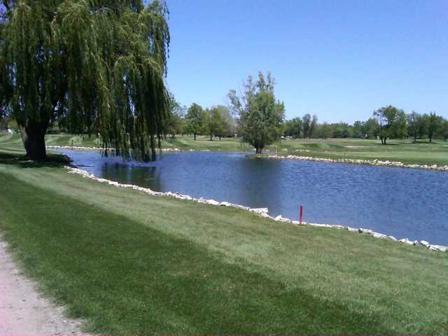 A view over the pond of hole #2 at Juday Creek Golf Course