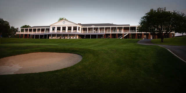 A view of a hole and the clubhouse at Fort Wayne Country Club