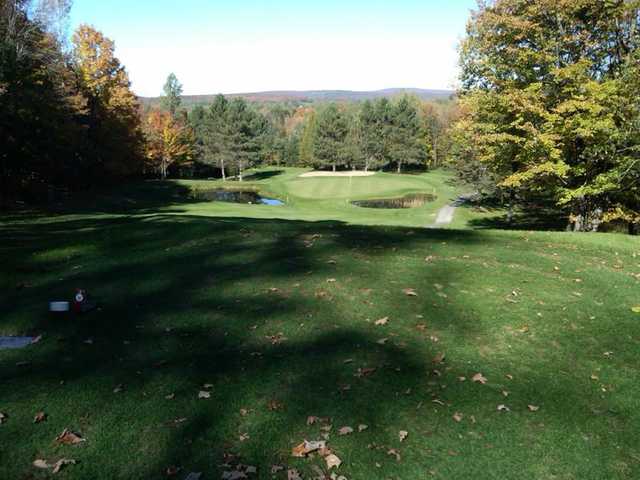 A fall day view of a hole at Royal Estrie Golf Club