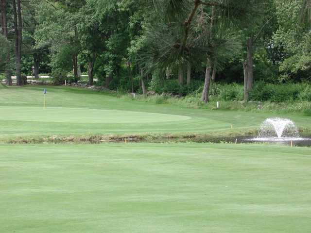A view of the 8th green with water coming into play at Cochecho Country Club