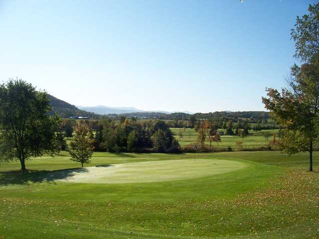 A fall view of a green at Rocky Ridge Golf Club