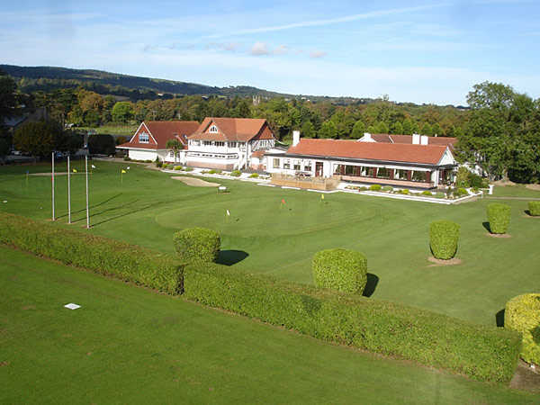 A view of the 18th hole and clubhouse in background at Woodbrook Golf Club