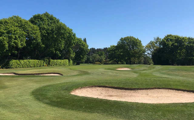 A sunny day view of tricky bunkers at Bramhall Golf Club.