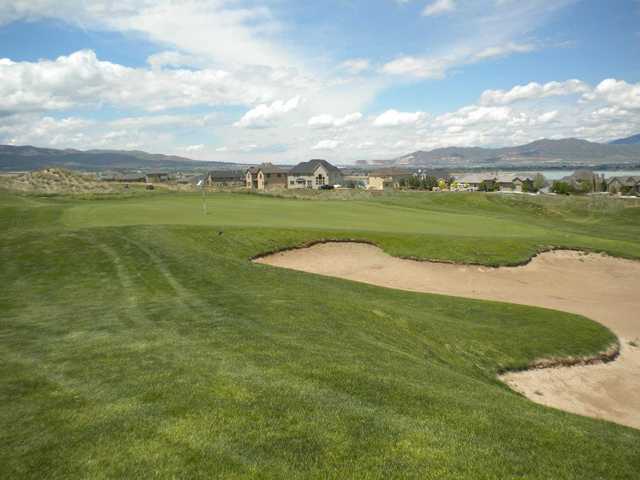 A view of green protected by bunker at TalonsCove Golf Course.