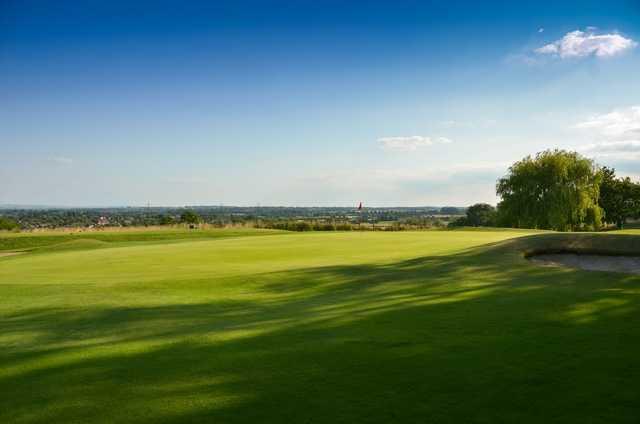The 5th green with countryside views at Chippenham Golf Club