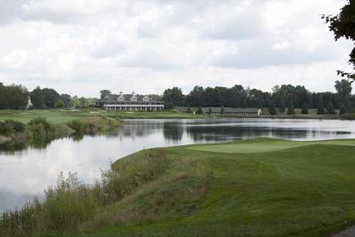 A view of the 17th tee with the clubhouse in background at Hawk Hollow Golf Course
