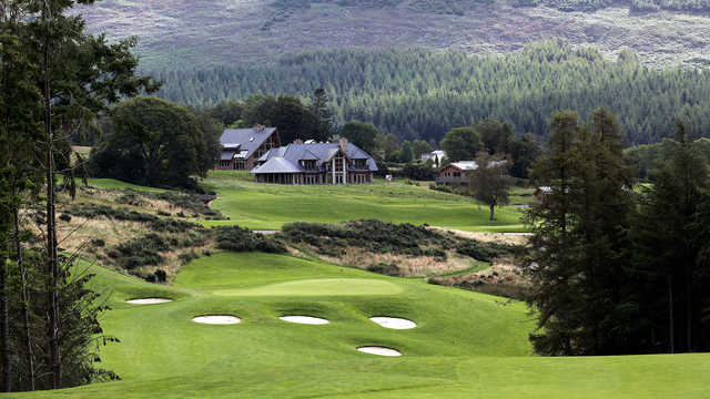 A view of a green protected by a collection of bunkers at Macreddin Golf Club.