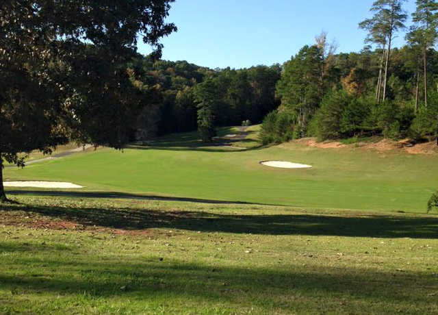 A sunny day view of a fairway at Foxwood Hills Country Club.