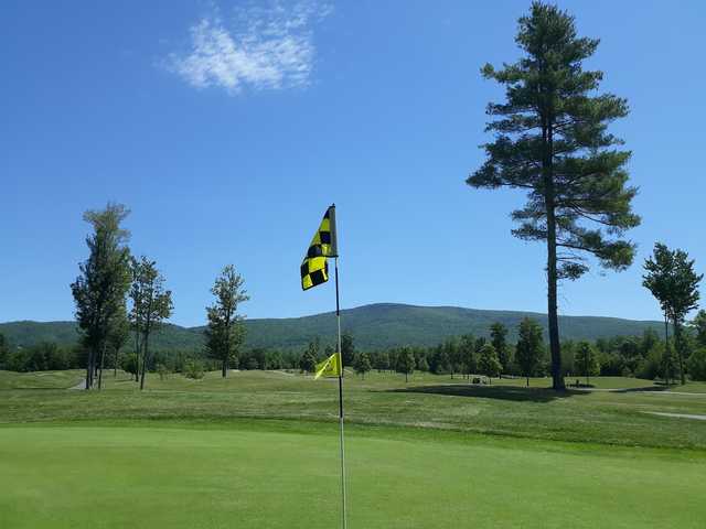 A sunny day view from a green at Birch Hill Country Club