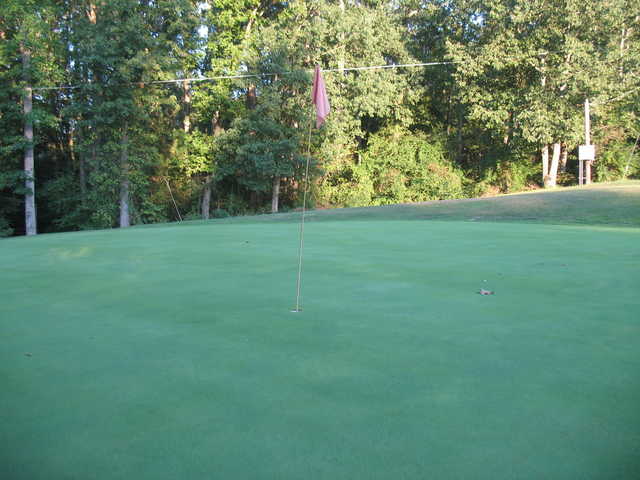A sunny day view of a hole at Brookside Golf Course.