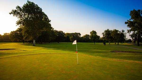 A sunny day view of a green at James E. Stewart Golf Course