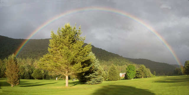 A view of a rainbow over White River Golf Club