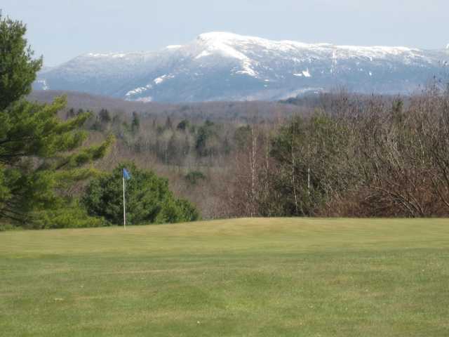 A view of hole #17 and Mt. Mansfield in the distance at Essex Country Club