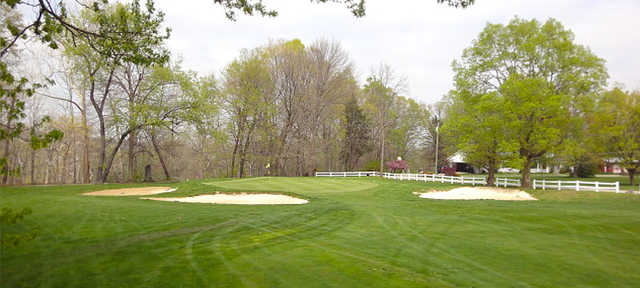 A view of the 5th green flanked by bunkers at Crawfordsville Country Club