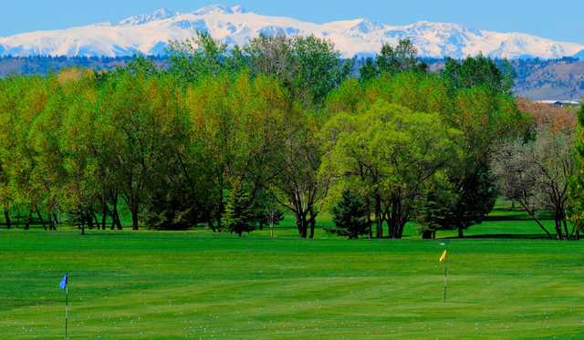A view from Yellowstone Country Club with the Beartooth Mountains in background