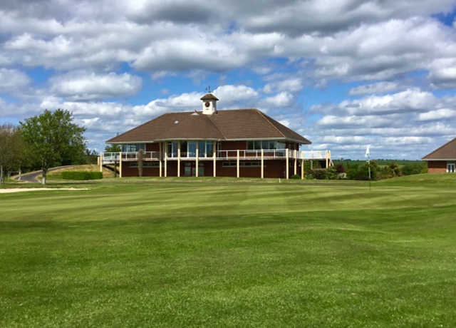 A view of a hole and the clubhouse at Kinsale Golf Club.