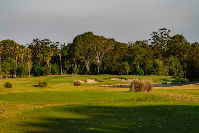 View of the 13th hole from The Palms at Sanctuary Cove Resort.