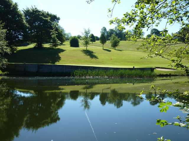 A view over the water of hole #16 at Woodlake Park Golf and Country Club