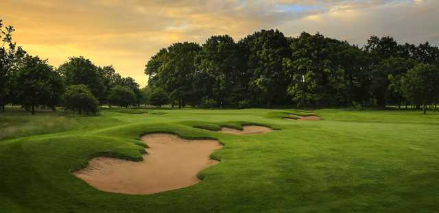 A sunset view of a green at Kedleston Park Golf Club.