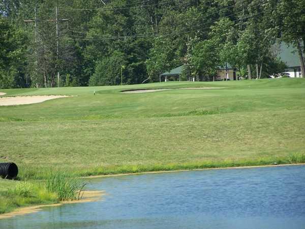 A view over the water of the 9th green at East Course from Bridgewater Golf Club