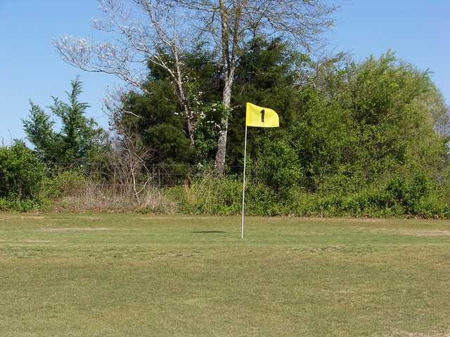 A view of green #1 at Whispering Pines Golf Course