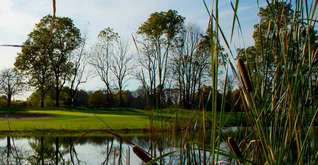 A view of a green with water coming into play at Wood Wind Golf Club.