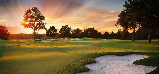 A sunset view from the right side of a fairway at Heritage Course from Shangri-La Country Club.