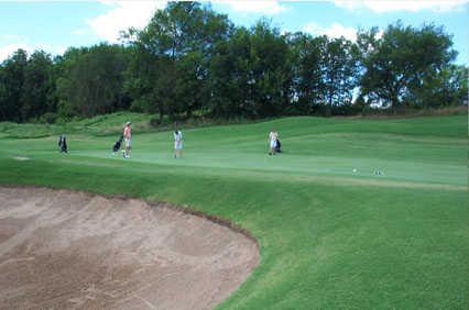 A view of green guarded by bunker at Peoria Ridge
