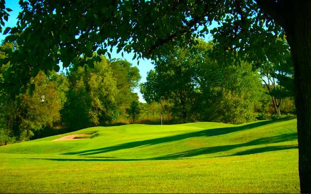 A sunny day view of a hole at Hidden Creek Golf Club.