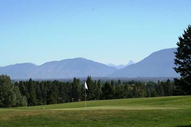 A view of a hole with mountains in background at Buffalo Hill Golf Club