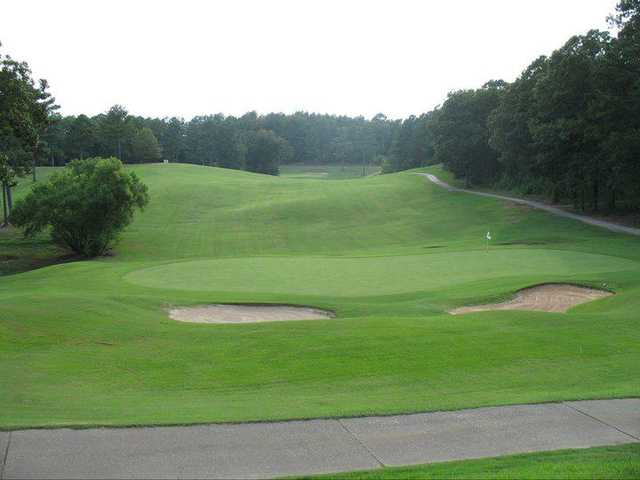 A view of a hole protected by bunkers at Alpine Bay Resort