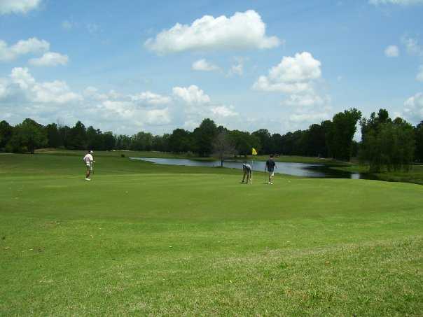 A view of a green with water coming into play from right at Tallapoosa Lakes