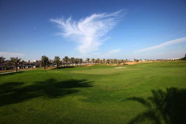 A view of a green at Al Hamra Golf Club and Resorts