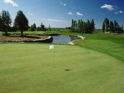 View of the 5th green at Club de Golf Les Vieux Moulins