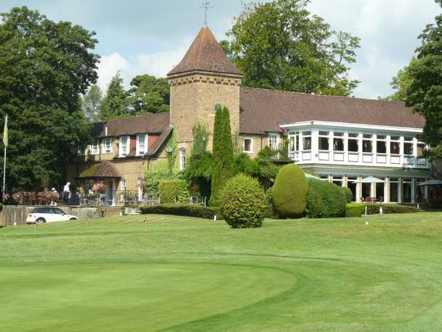 A view of the clubhouse and practice putting green at Badgemore Park Golf Club