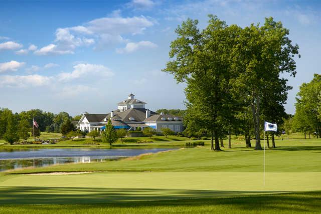 A view of green #10 and the clubhouse in the distance at Barrington Golf Club