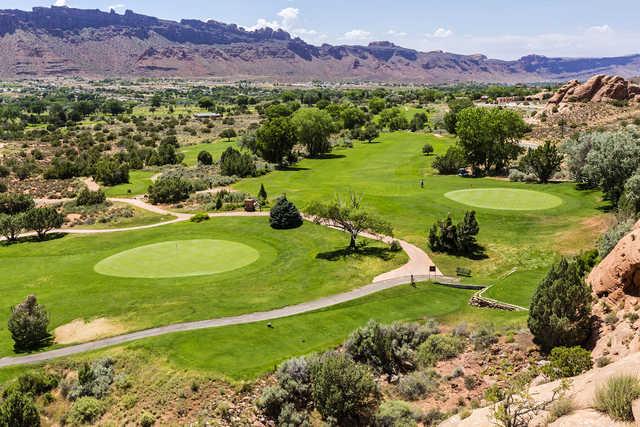 A view of two greens at Moab Golf Club.
