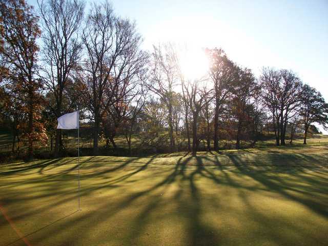 A sunny day view of a hole at Buncombe Creek Golf Course