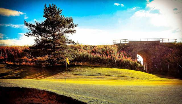 A sunny day view of a hole at Greenburn Golf Club.