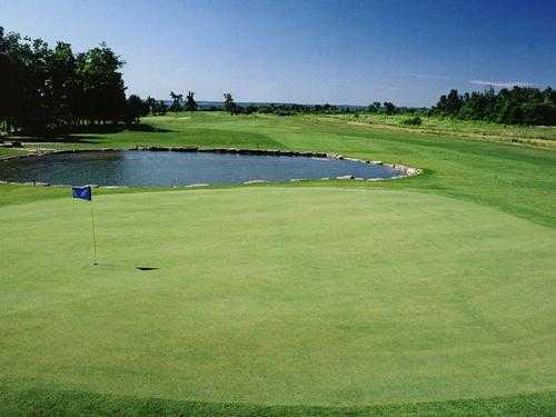 The 16th green at Les Vieux Moulins Golf Club