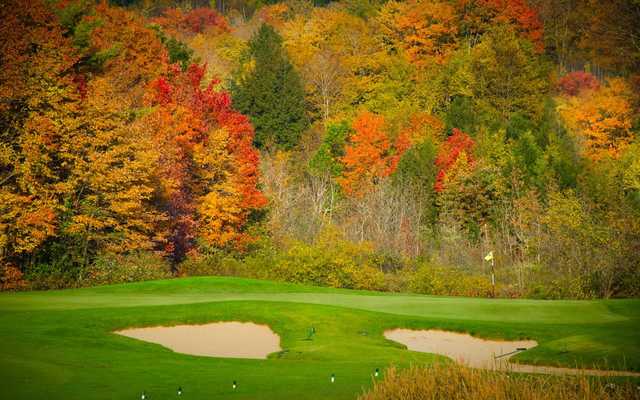 A beautiful fall view of a green at Manchester Country Club