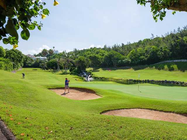 A sunny day view of a hole at Belmont Hills Golf Club.