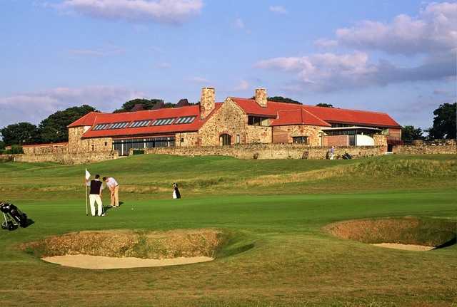 Craigielaw Golf Club's large, stone clubhouse overlooks the golf course and ninth green. (B. Tucker)