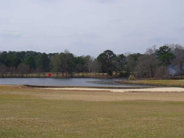 A view of a hole with water coming into play at Sanctuary Golf Club from Lakepoint State Park