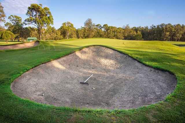 View of a green and bunker at Redland Bay Golf Club.