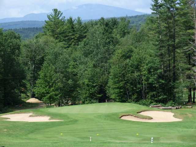 A view of the 10th green flanked by sand traps at Mojalaki Country Club