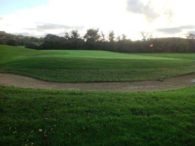 The sloping greens can present a challenge and require good shot accuracy to stay near the pin