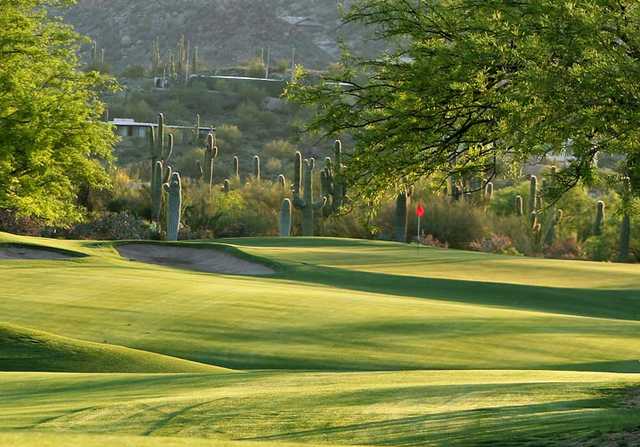 A sunny day view from a fairway at Desert Forest Golf Club