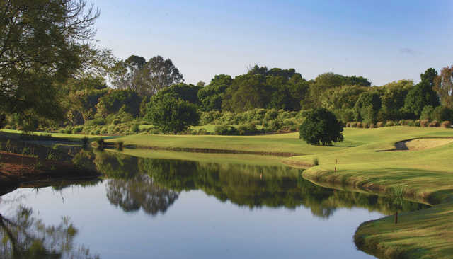A view over the water of a hole at Indooroopilly Golf Club.